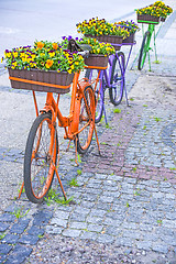 Image showing bicycles with flowers