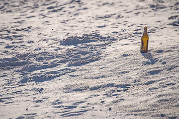 Image showing beer bottle on a beach