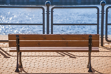 Image showing park bench at a seaport