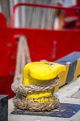 Image showing Bollard with mooring line of a trawler