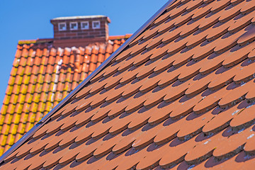 Image showing Red, new roofs tiles of a roof