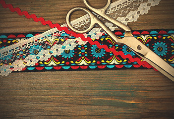 Image showing vintage scissors and antique ribbons