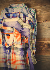 Image showing bright shirts in a stack