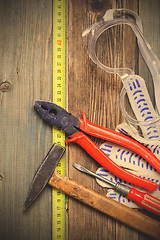 Image showing vintage tool set and safety gloves and glasses