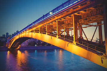 Image showing Night urban landscape with old Smolensky Metro Bridge in Moscow