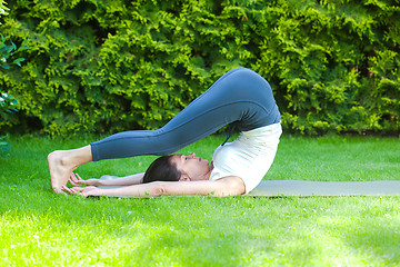 Image showing beautiful adult woman doing yoga