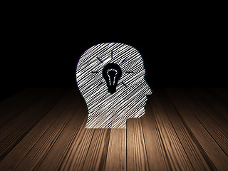Image showing Data concept: Head With Light Bulb in grunge dark room