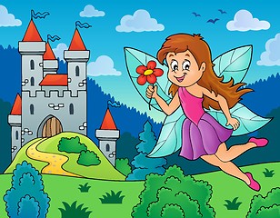 Image showing Happy fairy near castle