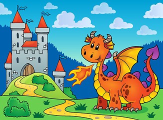 Image showing Happy orange dragon near castle
