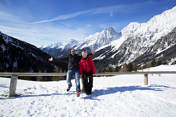 Image showing Happy couple having fun in winter landscape 