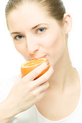 Image showing young woman with orange