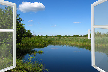 Image showing opened window to the summer lake