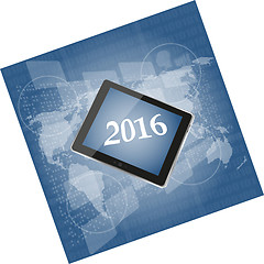 Image showing tablet pc or smart phone on business digital touch screen, world map, happy new year 2016 concept