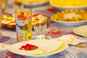 Image showing crockery glass plate and wine-glass on the table