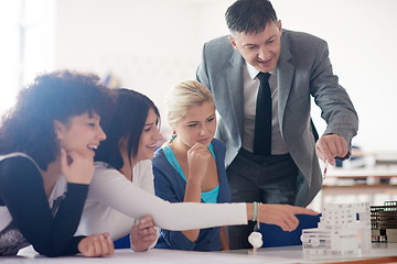 Image showing group of students with teacher on class