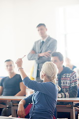 Image showing group of students with teacher on class