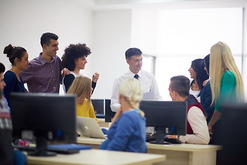 Image showing students with teacher  in computer lab classrom