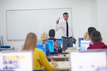 Image showing students with teacher  in computer lab classrom