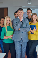 Image showing group portrait of teacher with students