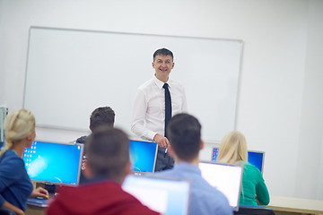 Image showing students with teacher  in computer lab classrom