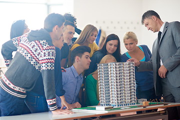 Image showing group of students with teacher on class