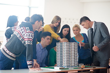 Image showing group of students with teacher on class