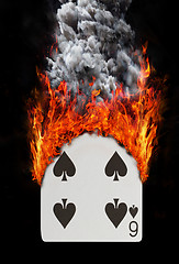 Image showing Playing card with fire and smoke