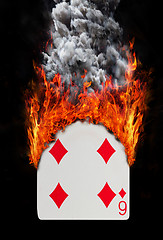 Image showing Playing card with fire and smoke