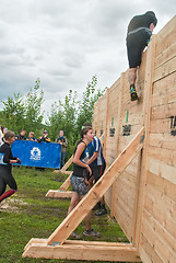 Image showing Teams storm wall in extrim race. Bastion stage