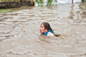 Image showing Woman swims in race. Steel Character. Tyumen