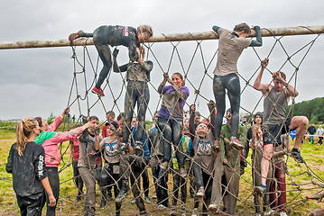 Image showing Team storms net wall in extrim race. Tyumen.Russia