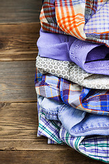 Image showing stack of colored shirts