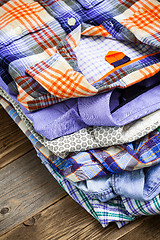 Image showing bright shirts in a pile