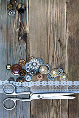 Image showing vintage buttons, lace, and a dressmaker scissors