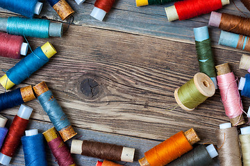 Image showing Vintage spools with colored threads