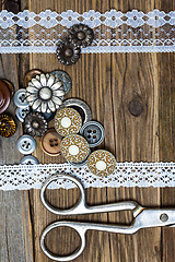 Image showing vintage buttons, lace, and a dressmaker scissors