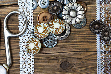 Image showing vintage buttons, lace, and a tailor scissors