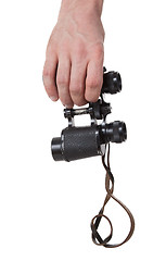 Image showing Vintage binocular in mans hand