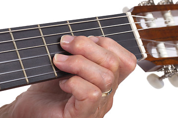 Image showing Old hand and guitar isolated