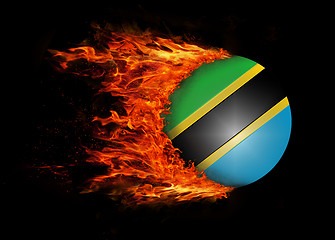 Image showing Flag with a trail of fire - Tanzania