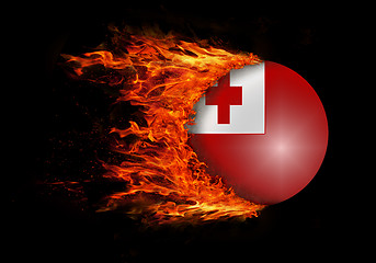 Image showing Flag with a trail of fire - Tonga