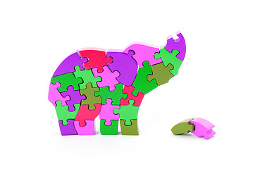 Image showing Colorful puzzle pieces in elephant shape