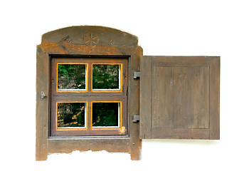 Image showing Old wooden window on a white wall.
