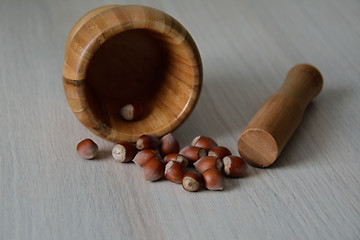 Image showing mortar, pestle, and nuts 