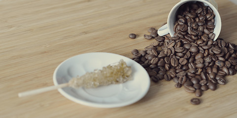 Image showing coffee beans and a sugar stick