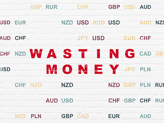 Image showing Banking concept: Wasting Money on wall background