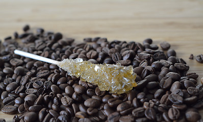 Image showing coffee and sugar on the wooden board