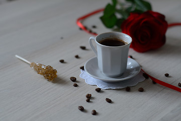 Image showing black coffee and a candy sugar