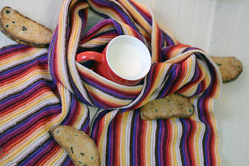 Image showing hot milk wrapped in scarf