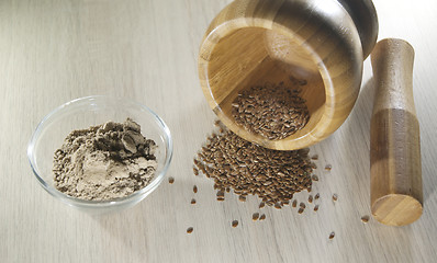 Image showing Flax in a small bowl and mortar